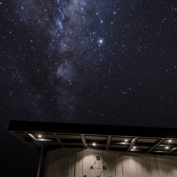 Milky Way shown above the Dark Sky Project base building in Dark 