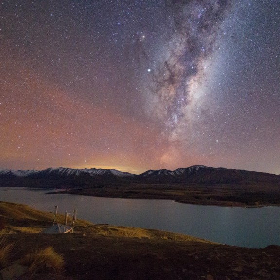 Scenic view of Milky way from mountain top with aurora 